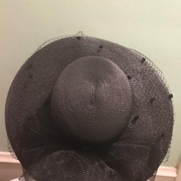 Black woven Kentucky Derby hat with flocked netting and black fascinator bow